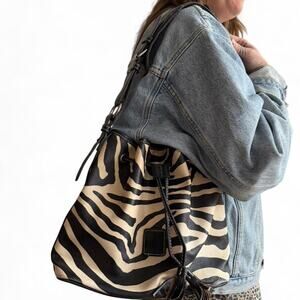 Zebra print bucket bag with adjustable straps faux leather
